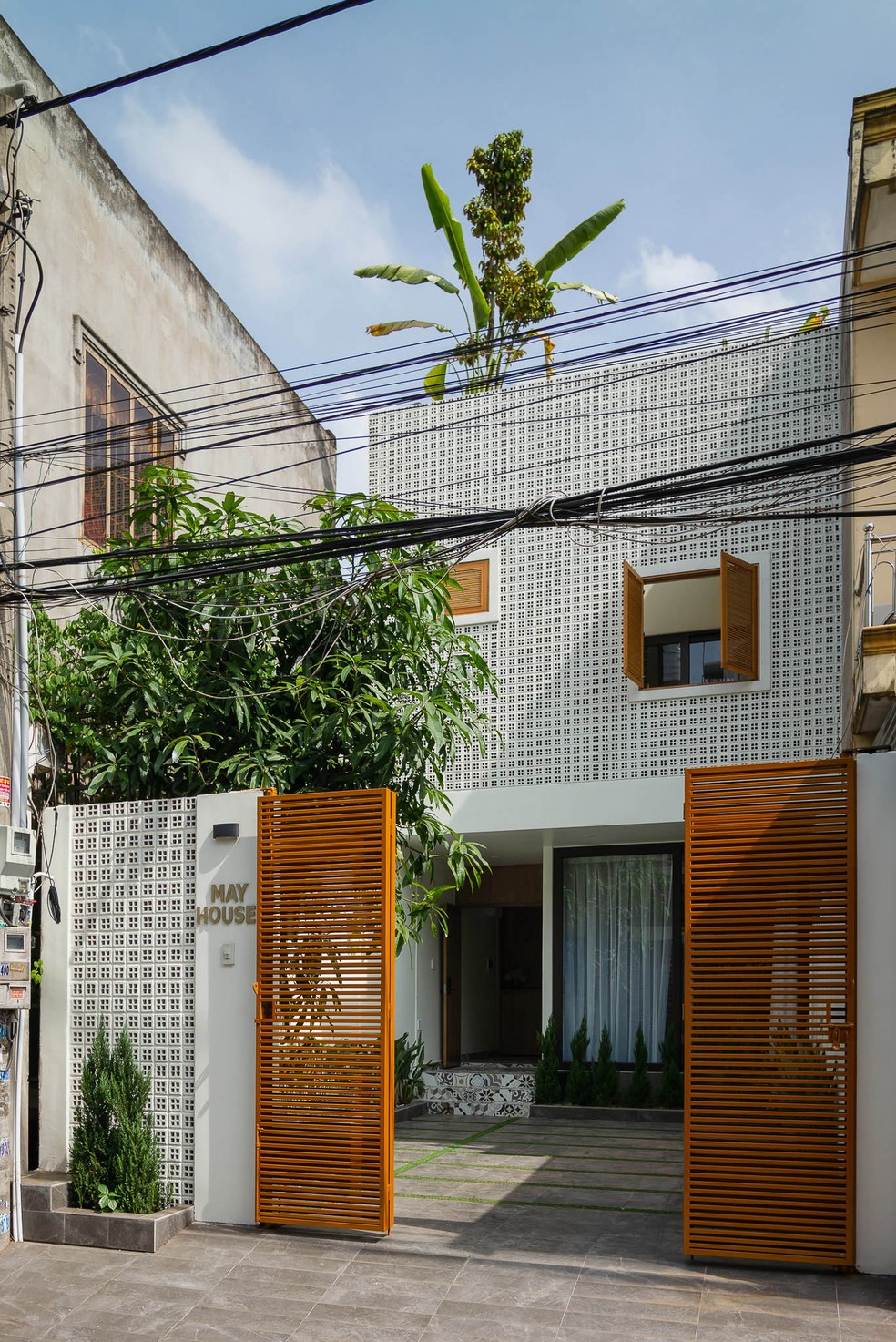 Desenhada para uma jovem famlia com dois filhos pequenos, a casa valoriza os ambientes de interao  Foto: Reproduo/90odesign